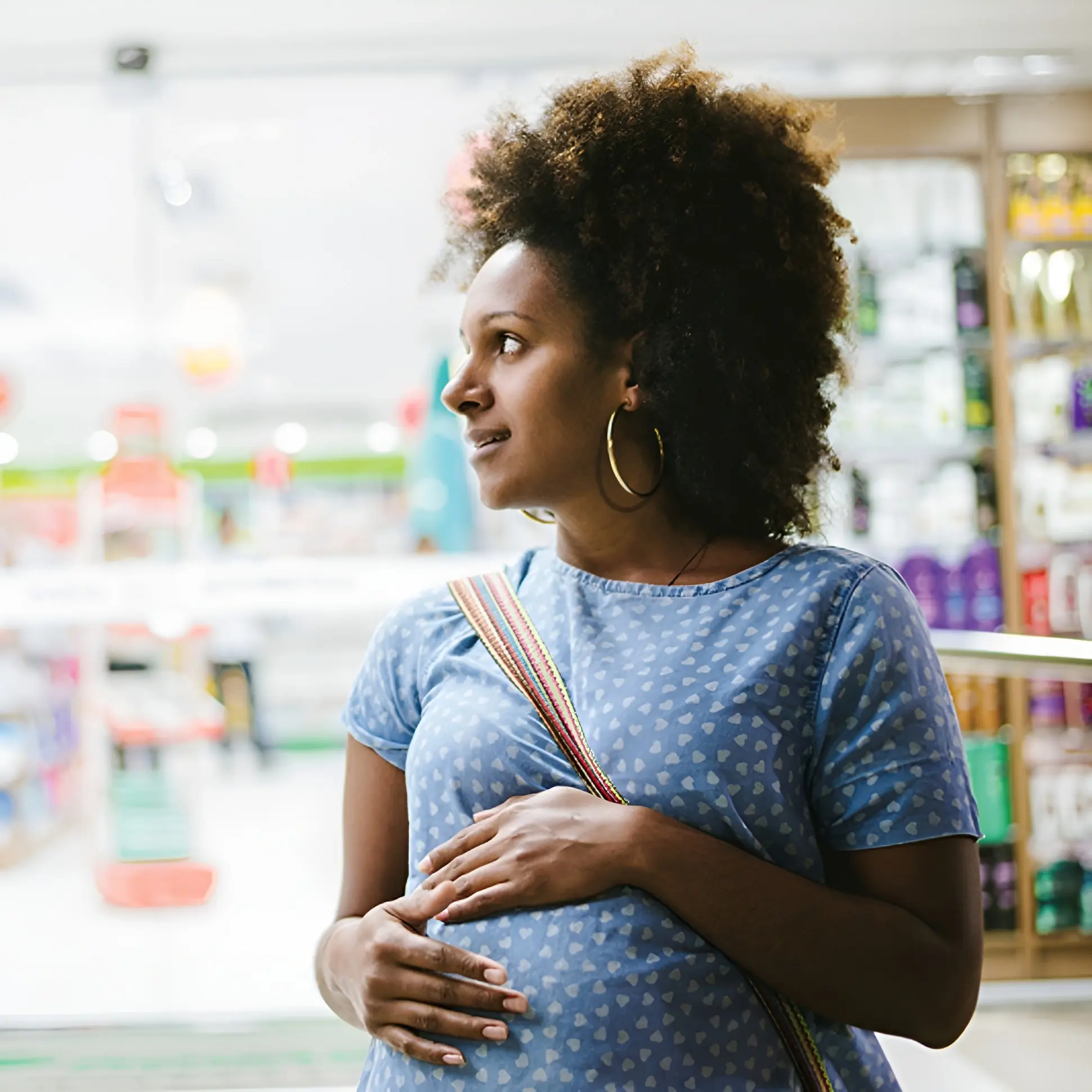 Pregnant woman shopping in a store