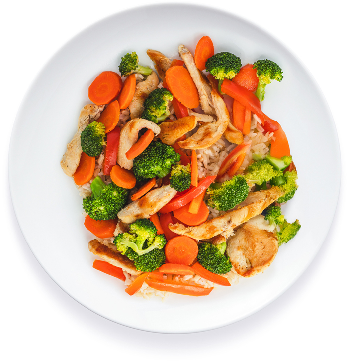 Chicken stir-fry with vegetables on white plate