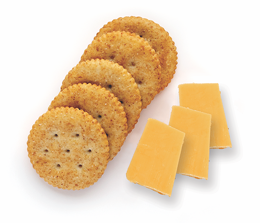Crackers and cheese arranged on a white background