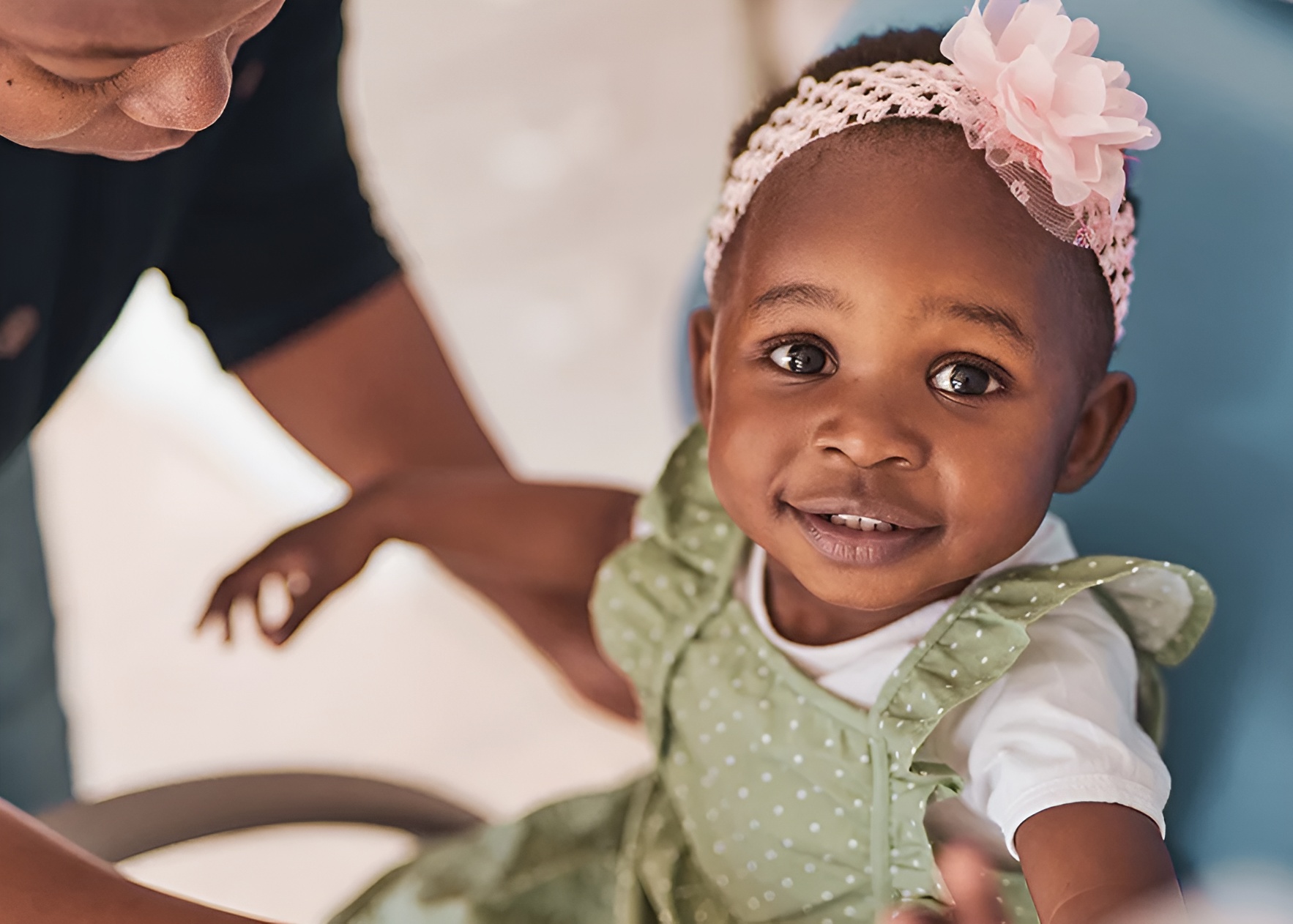 Toddler girl smiling at dentist visit
