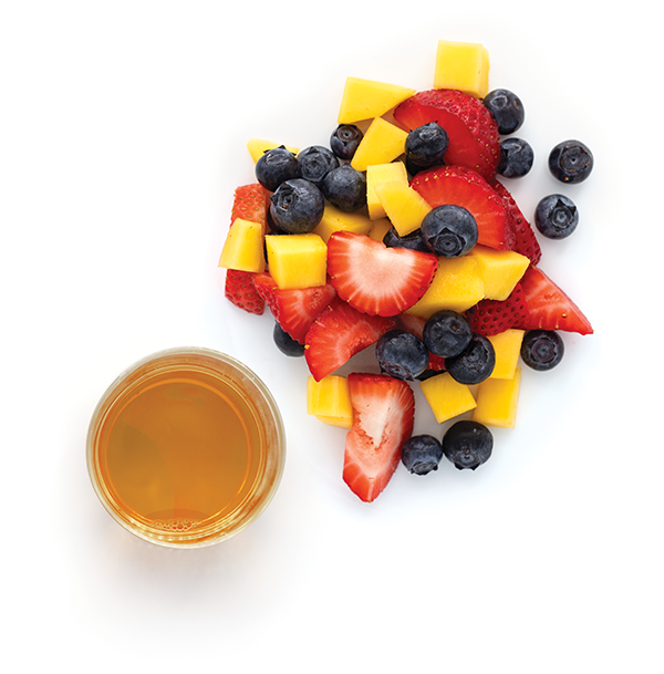 Mixed fruit and juice on white background