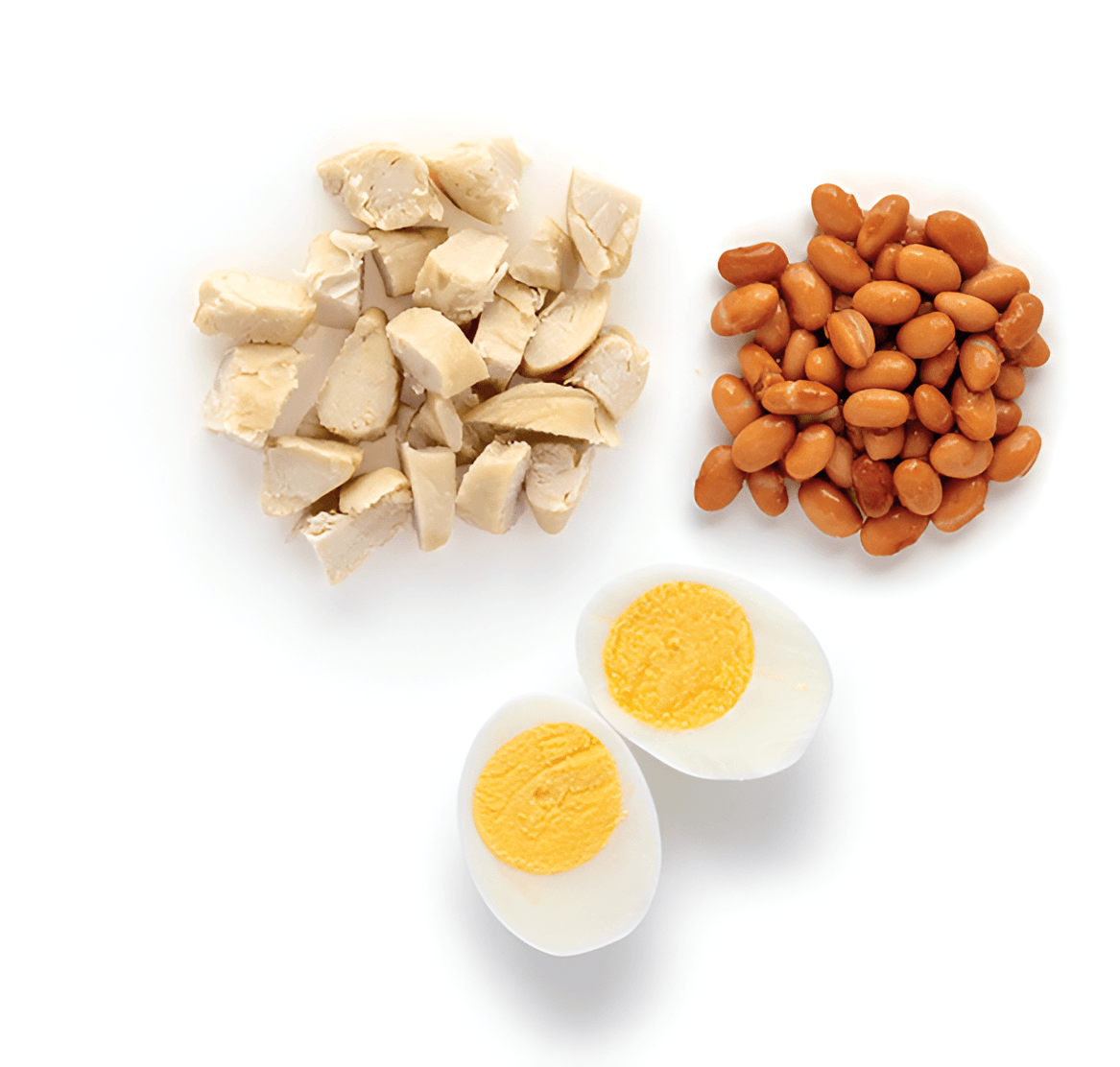 Boiled eggs, cooked beans, and chopped chicken pieces